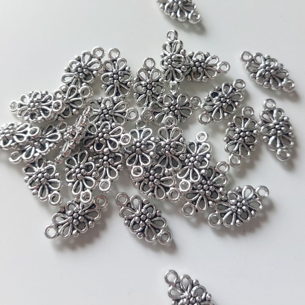30 Verbinder Blumen 16mm silberfarben